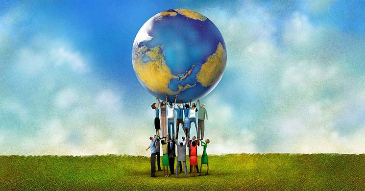 Several people working together to hold up the world